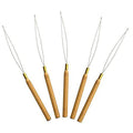 Professional light-brown wooden handle needle threader with a gold loop for hair extensions