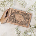 Tropics Wooden Photo Album featuring hand-engraved palm leaves on natural wood
