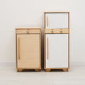 Minimalist scandi-style wooden play fridge for children in a bright playroom