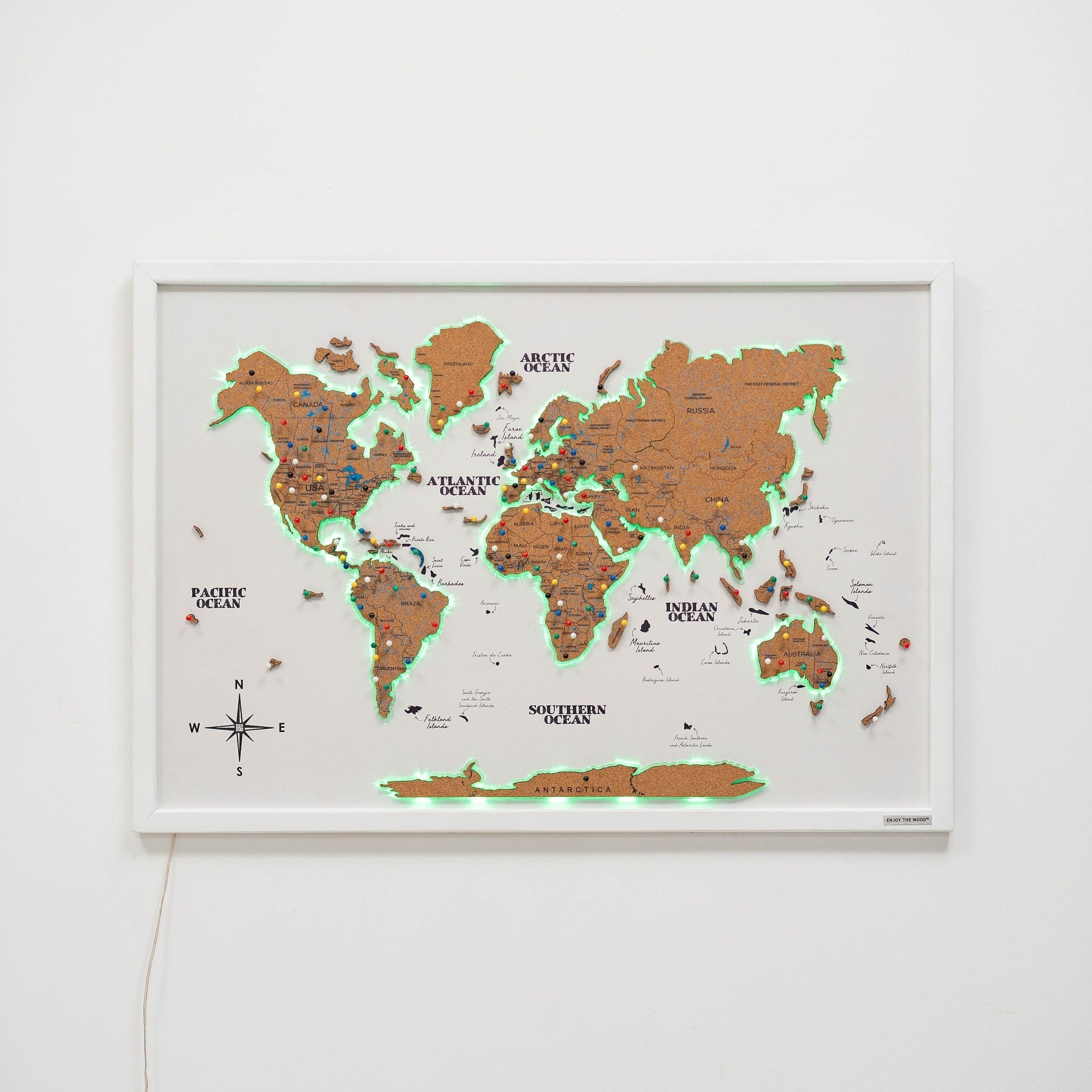 Map on Board LED 2.0 Cork wall map with illuminated wooden continents on a natural cork background