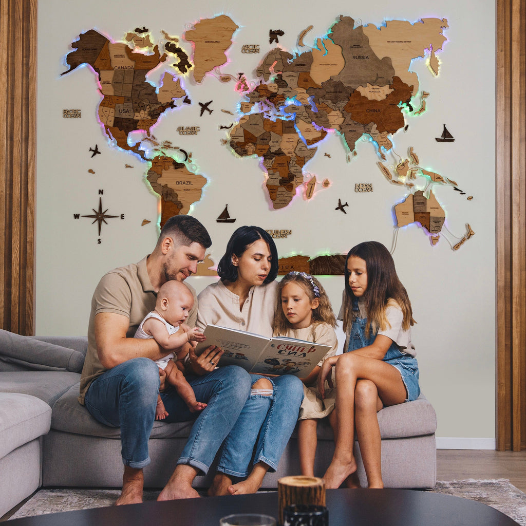 3D LED wooden world map with acrylic background and glowing lights installed on a wall