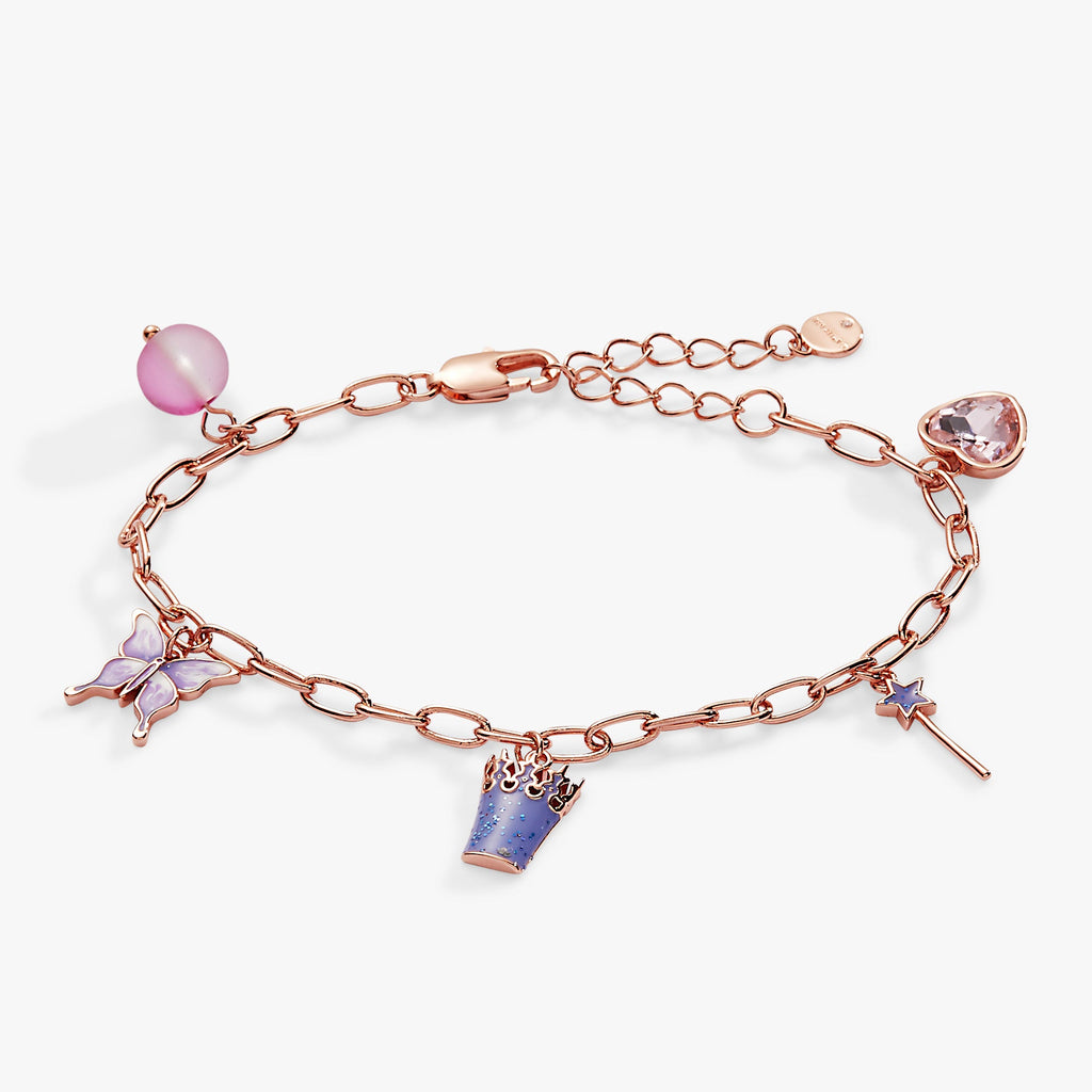 The Wizard of Oz Good Witch charm bracelet with crown, wand, butterfly, and pink heart crystal charms.