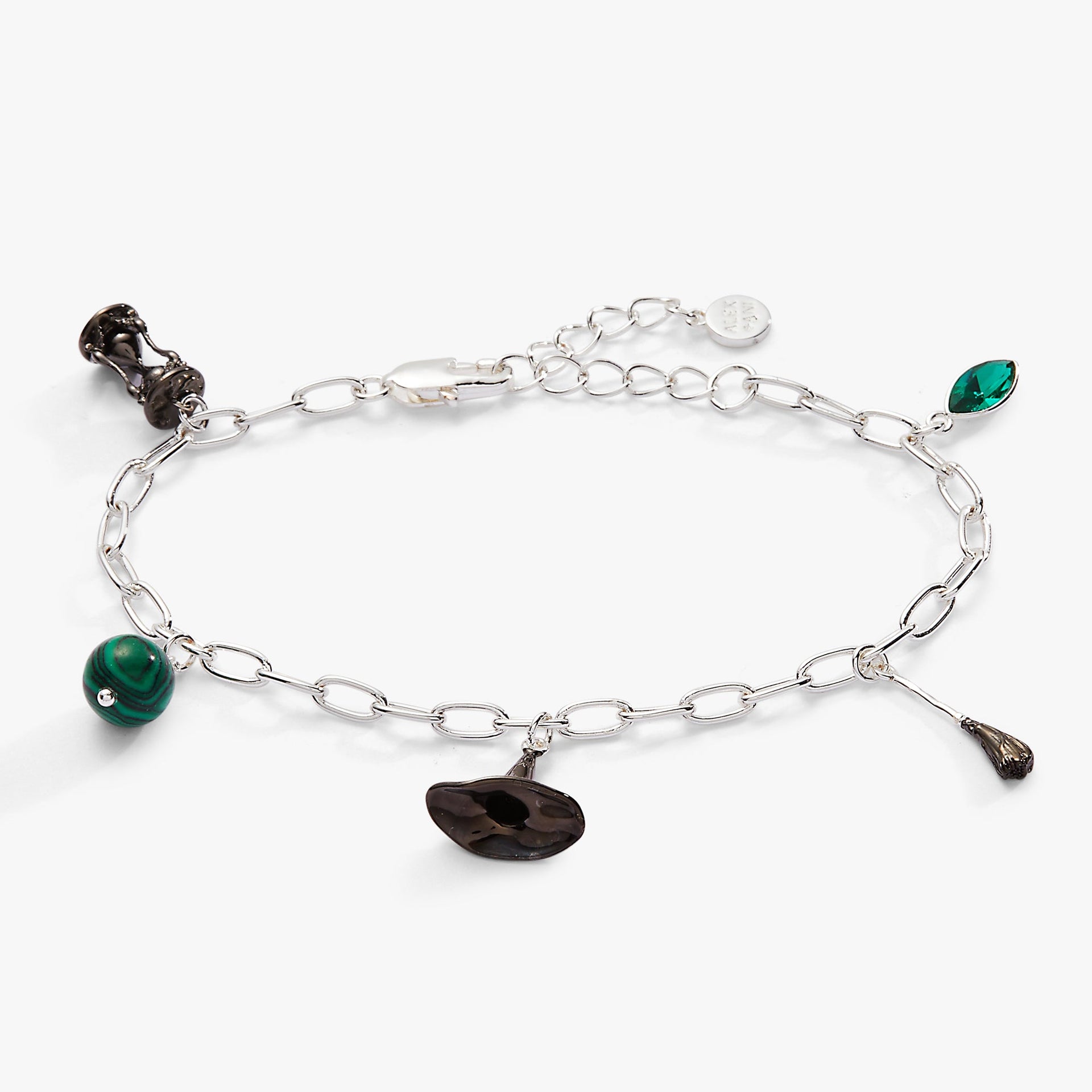 Silver-tone charm bracelet featuring Wizard of Oz Wicked Witch charms including a hat, broom, and green crystal