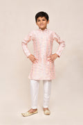 Baby pink art silk kurta paired with white straight fit pants for children