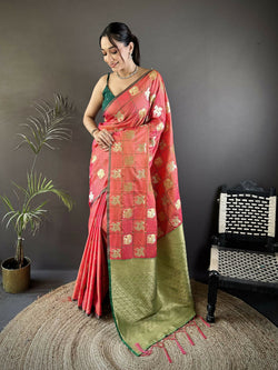 Orange soft silk Banarasi saree featuring elephant motifs with a contrasting green blouse