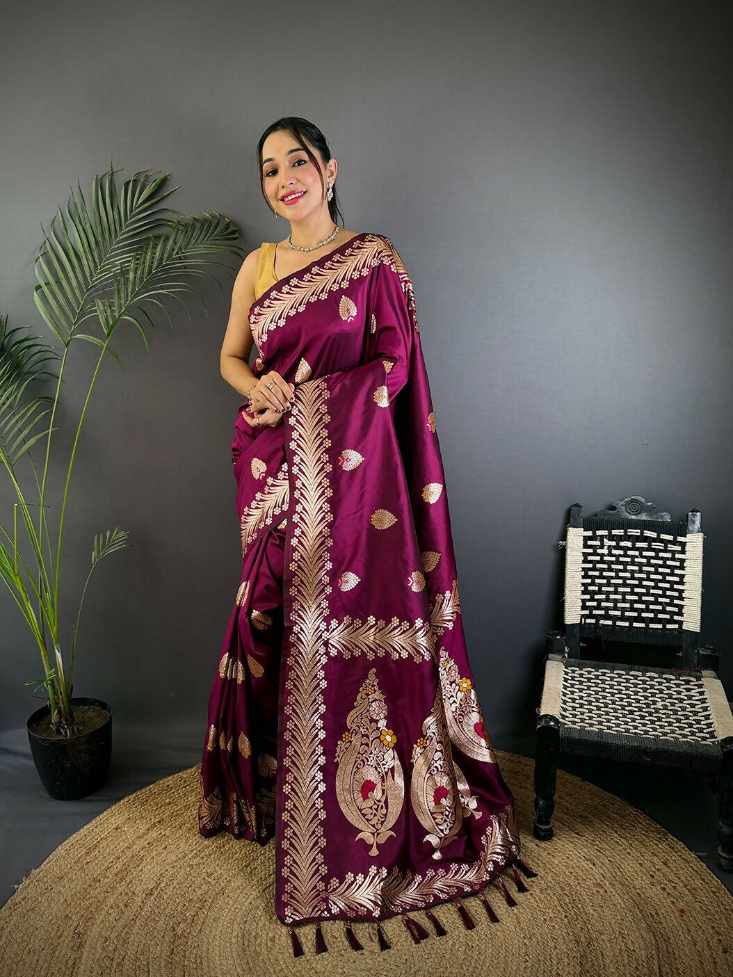 Plum soft silk saree with traditional gold woven patterns for women