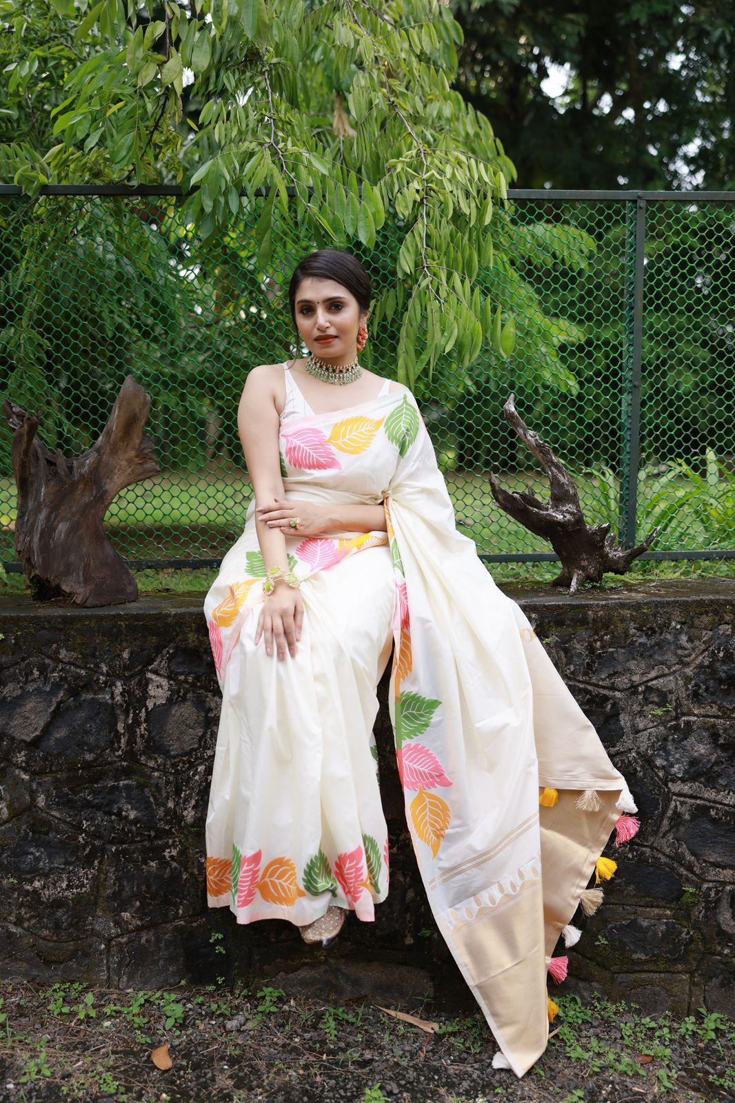 White Pure Silk Saree with Woven Design and Tassels