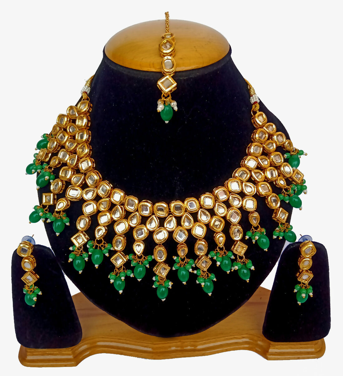 Gold-plated Kundan necklace and earring set with traditional stone detailing