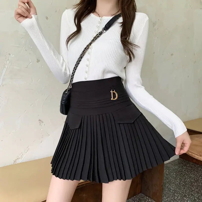 Women's High-Waisted Pleated Mini Skirt in Black or White - Image 3