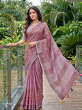 Elegant purple linen saree with matching blouse fabric, displayed for ethnic wear