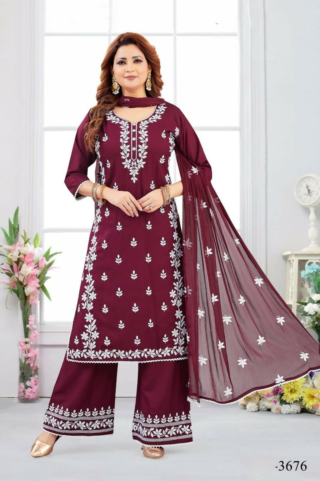 Elegant wine-colored 3-piece rayon kurta set with matching dupatta and cotton lining.