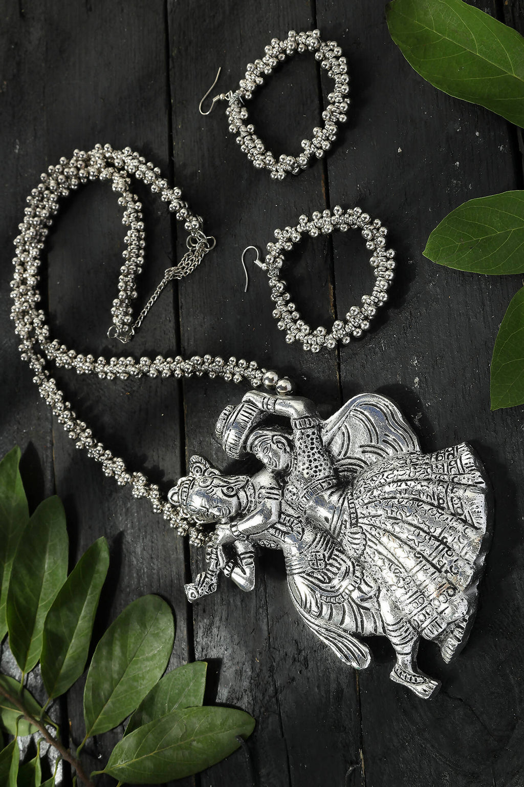 Radha Kishan motif long necklace in oxidised silver-plated brass finish