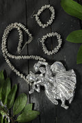 Radha Kishan motif long necklace in oxidised silver-plated brass finish