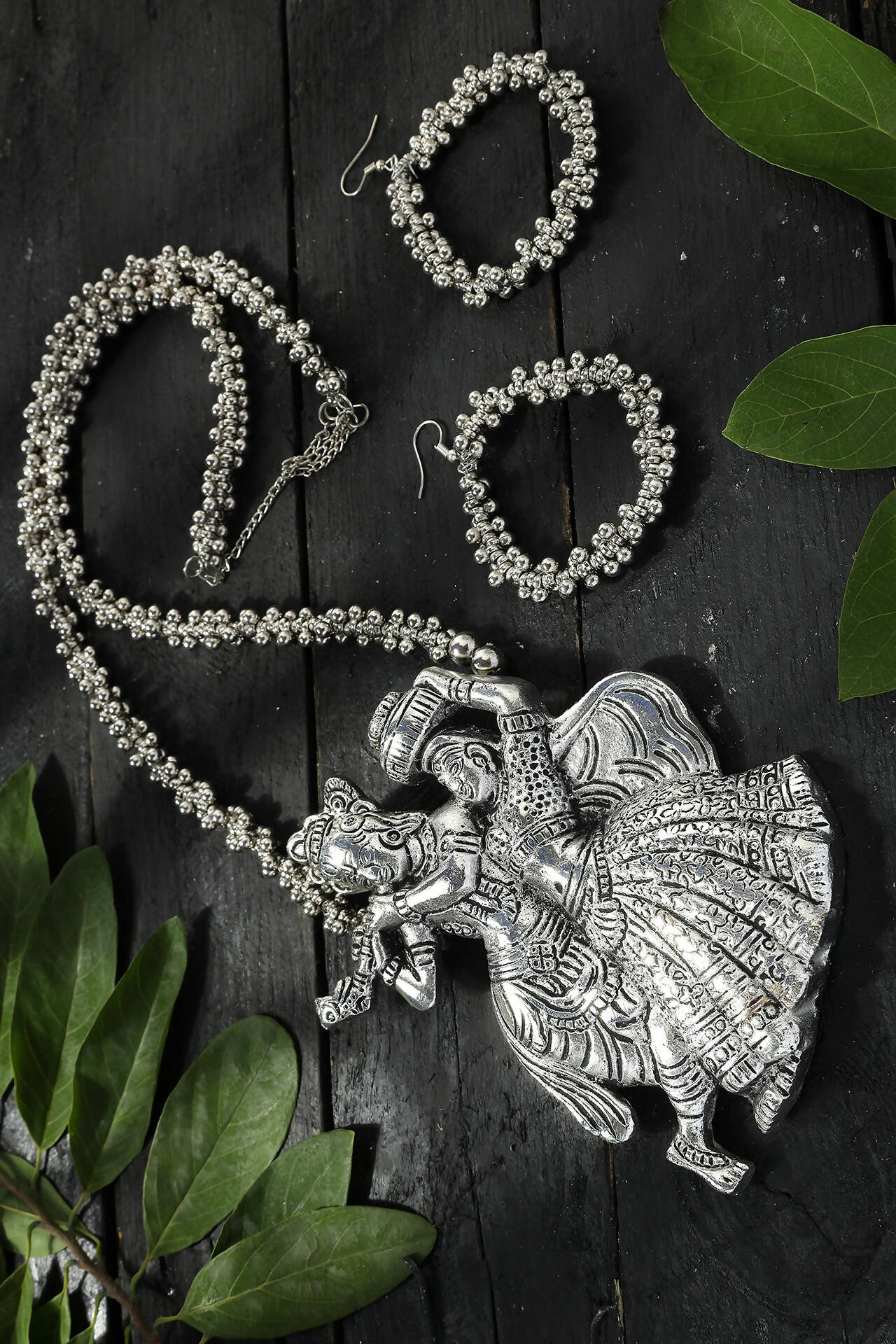 Radha Kishan motif long necklace in oxidised silver-plated brass finish