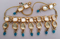 Elegant Firozi Kundan necklace set with gold plated finish and adjustable cord