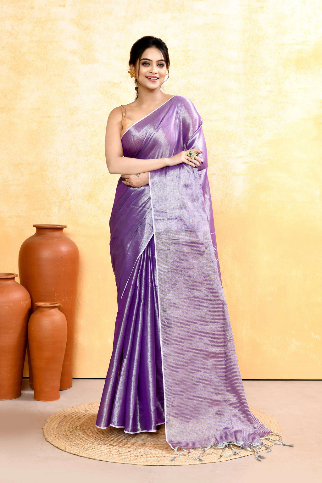 Elegant lavender dual tone organic tissue saree with matching blouse piece draped gracefully.