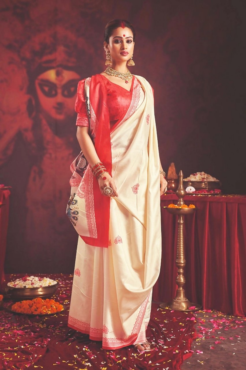 Off white silk blend Garad saree with traditional ethnic motifs and red blouse
