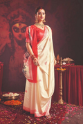 Off white silk blend Garad saree with traditional ethnic motifs and red blouse