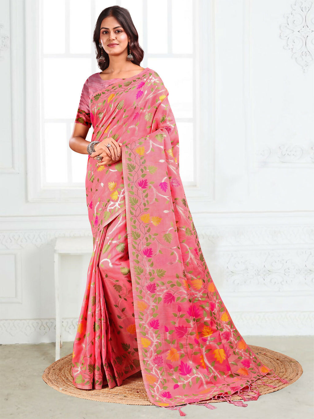 A beautiful pink linen cotton saree with matching blouse fabric