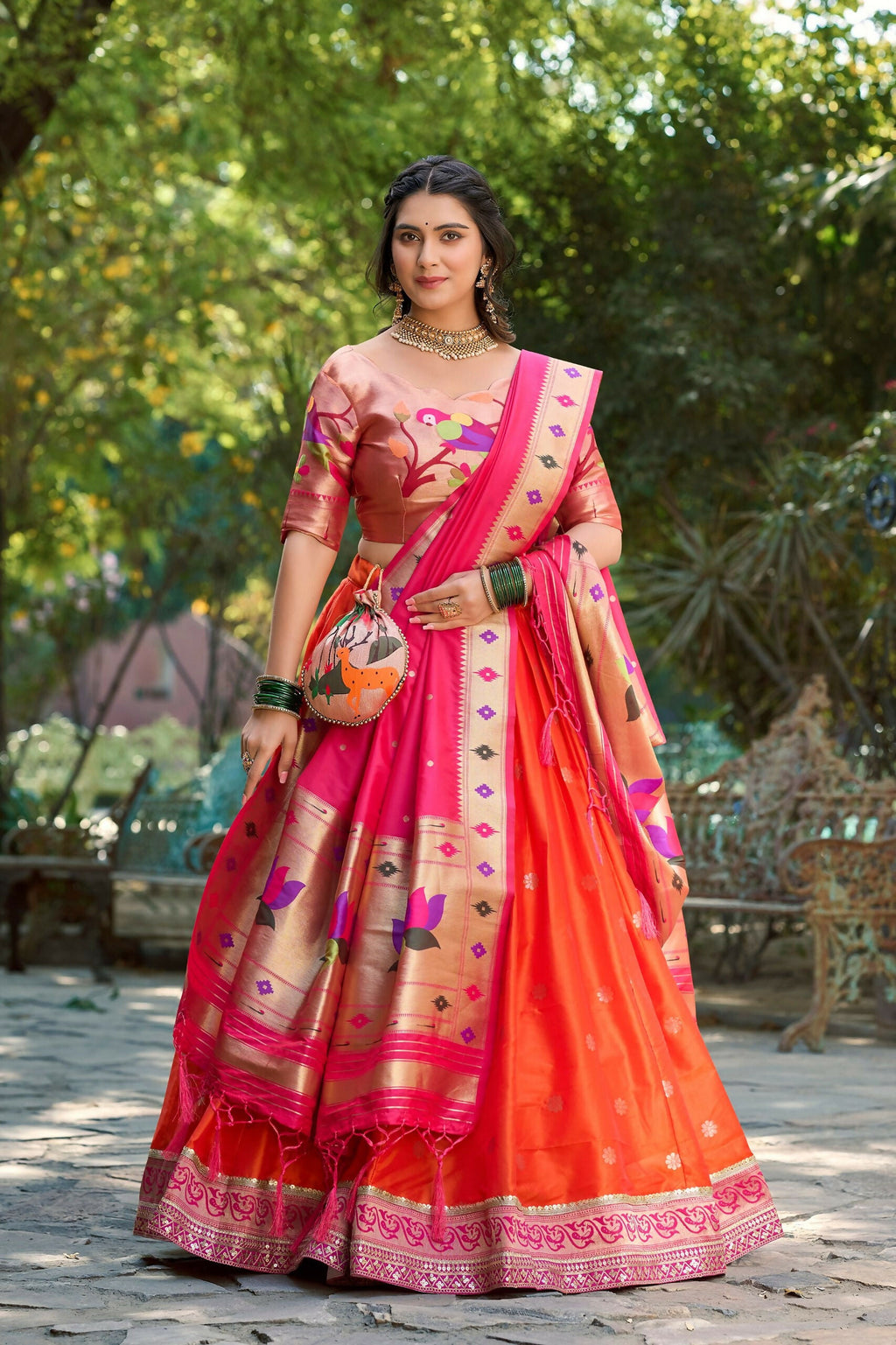 Model wearing a red Jacquard silk Paithani lehenga choli with traditional woven patterns.
