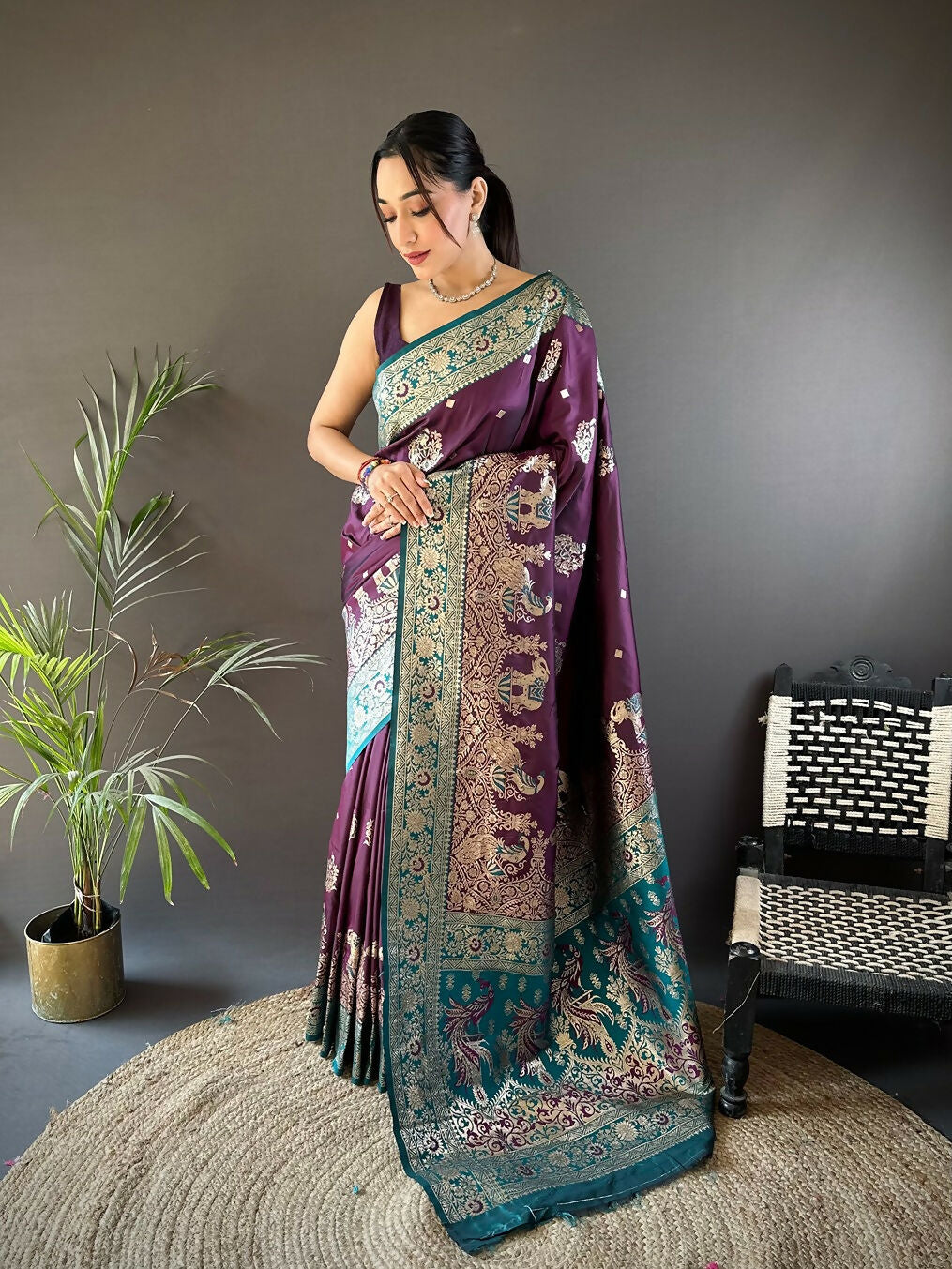 Dark green Paithani saree with peacock motifs and Meenakari details
