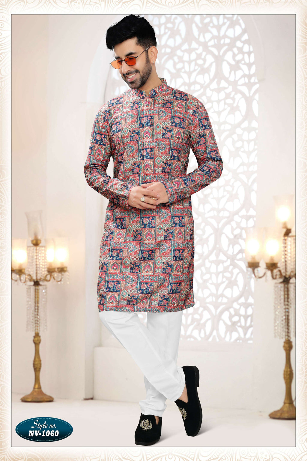 A straight-cut men's cream rayon kurta set featuring detailed all-over thread and sequence embroidery.