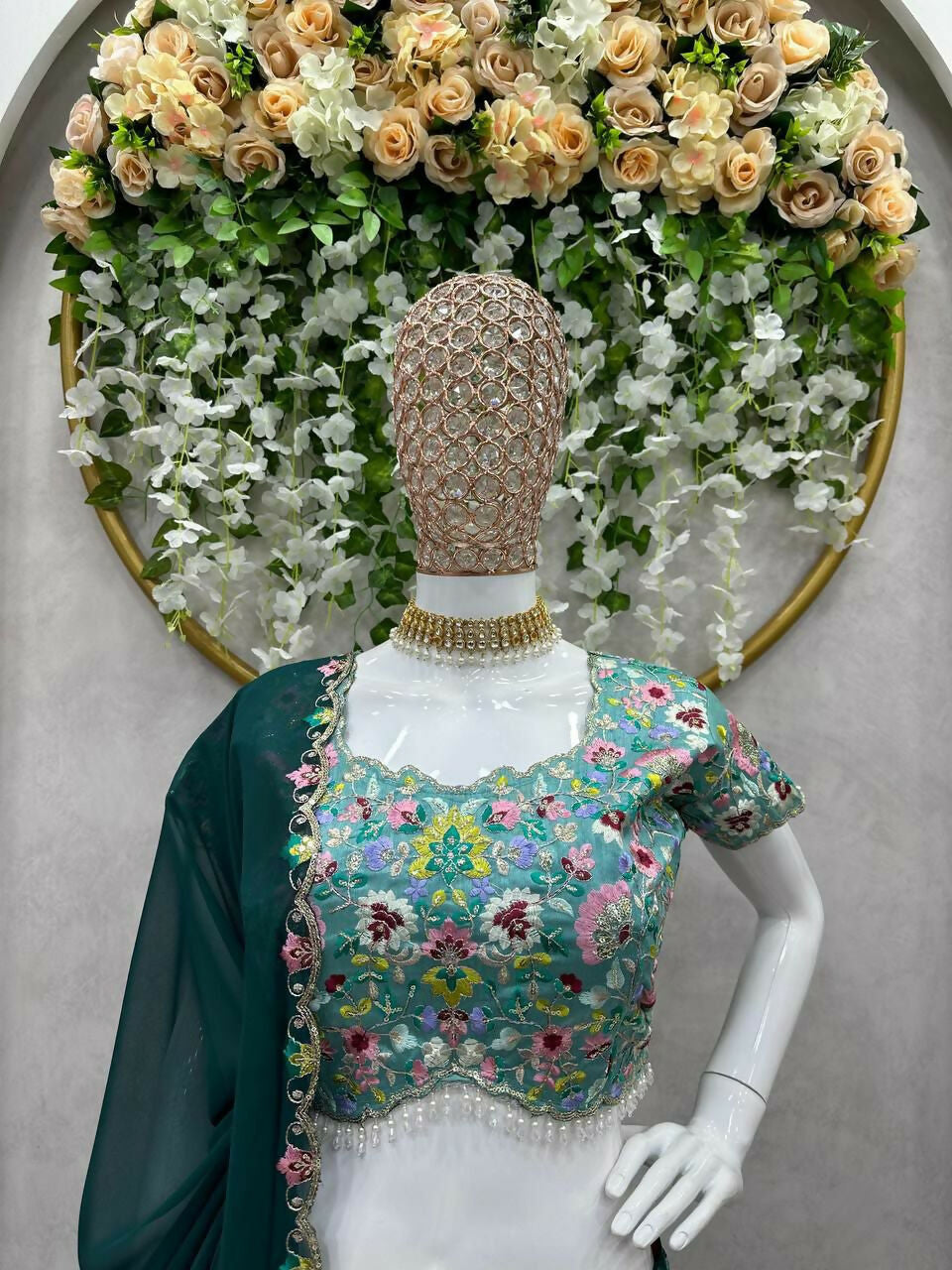 Bottle Green Faux Georgette Lehenga Choli with Sequins Embroidery
