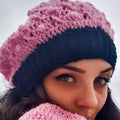 X's and O's crochet beanie and mittens set displayed on a soft background