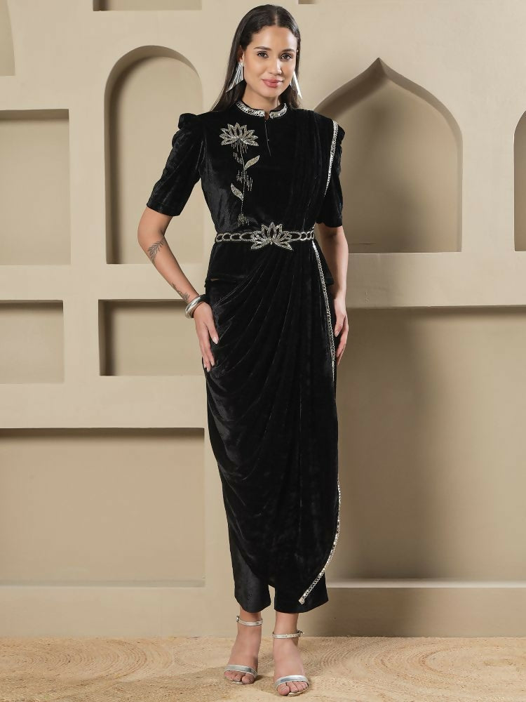 Full length black velvet kurta with detailed embroidery and half sleeves.