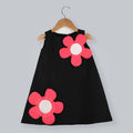 Black taffeta party dress with pink and white 3D scuba flower embellishments
