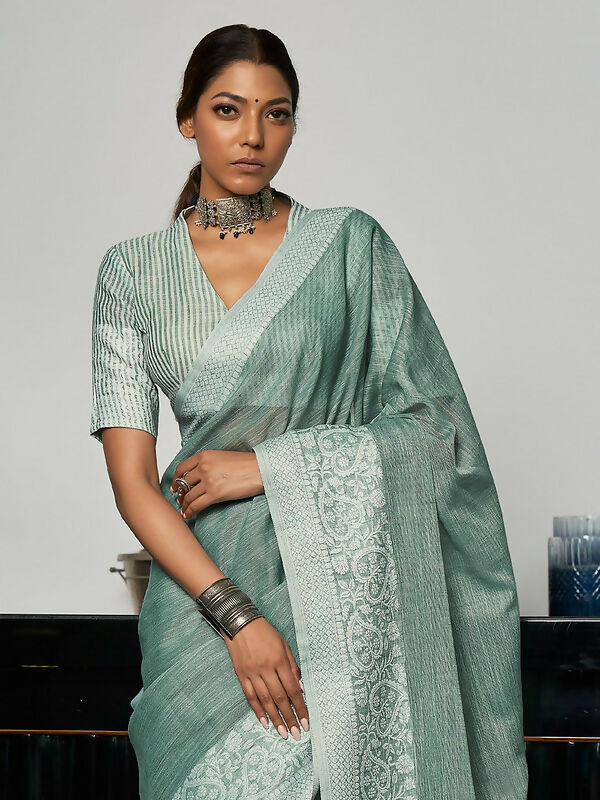 Sea Green Woven Linen Saree with Zari Border and Tassels