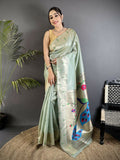 Pale blue tissue Paithani saree featuring peacock and floral motifs with a matching blouse piece