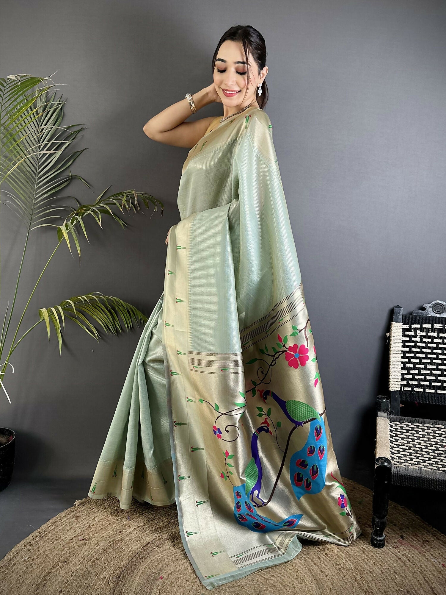 Pale Blue Tissue Paithani Saree with Peacock and Floral Motifs