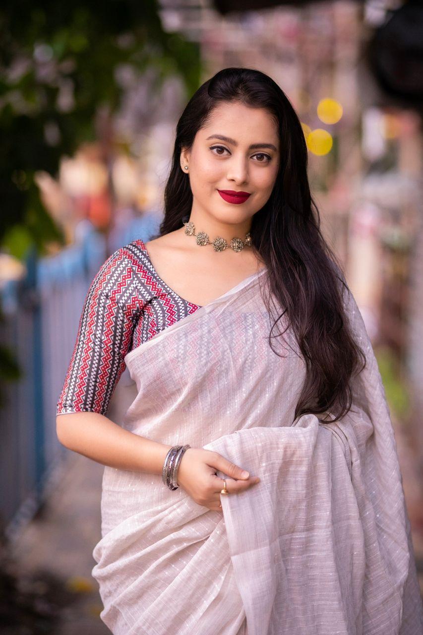 Grey Linen Saree with Golden Pattu Border and Self Check Design