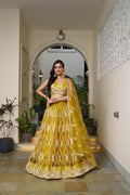 Mustard Yellow Butterfly Net Lehenga with white cotton thread and sequence embroidery