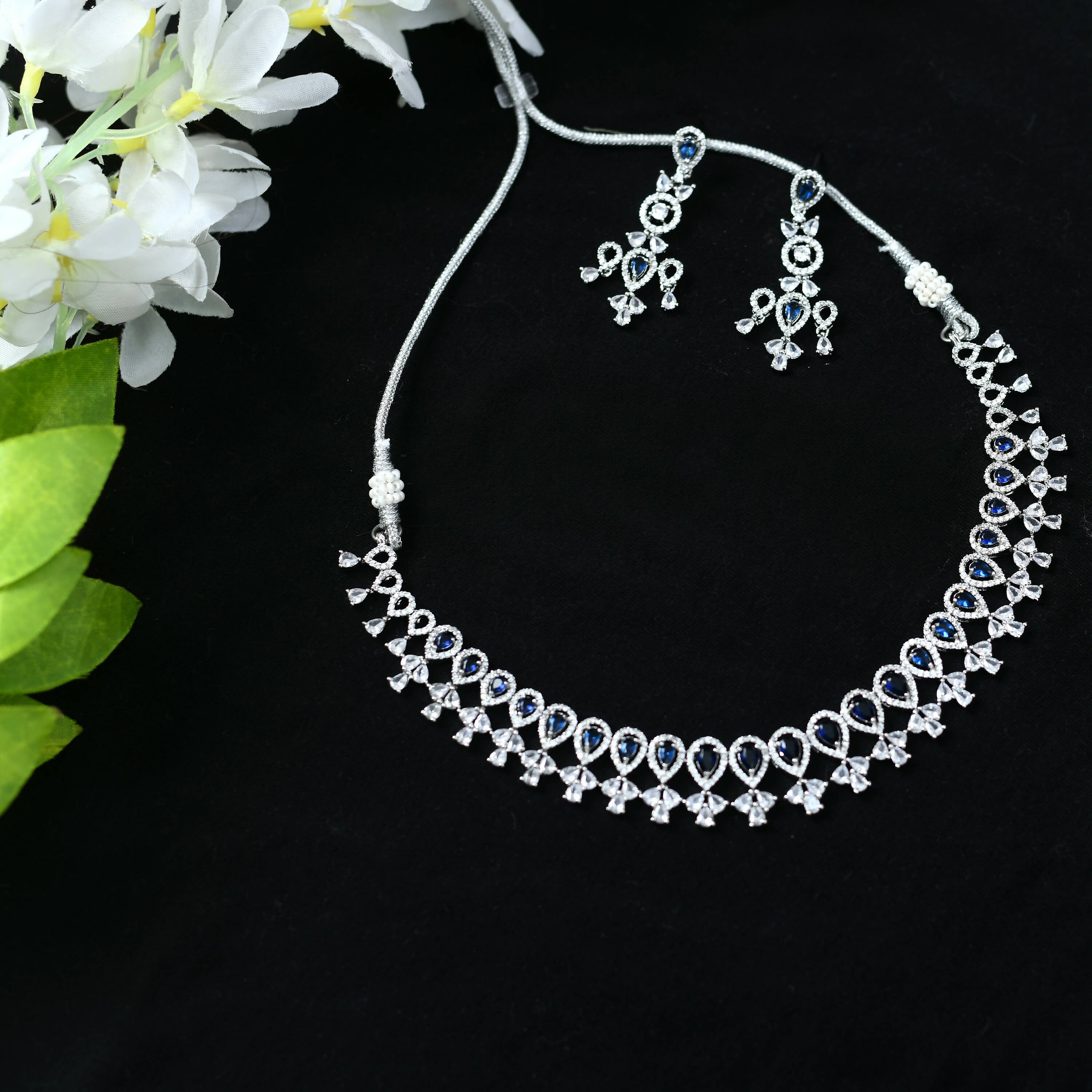 Silver-plated American Diamond choker set featuring blue stone accents