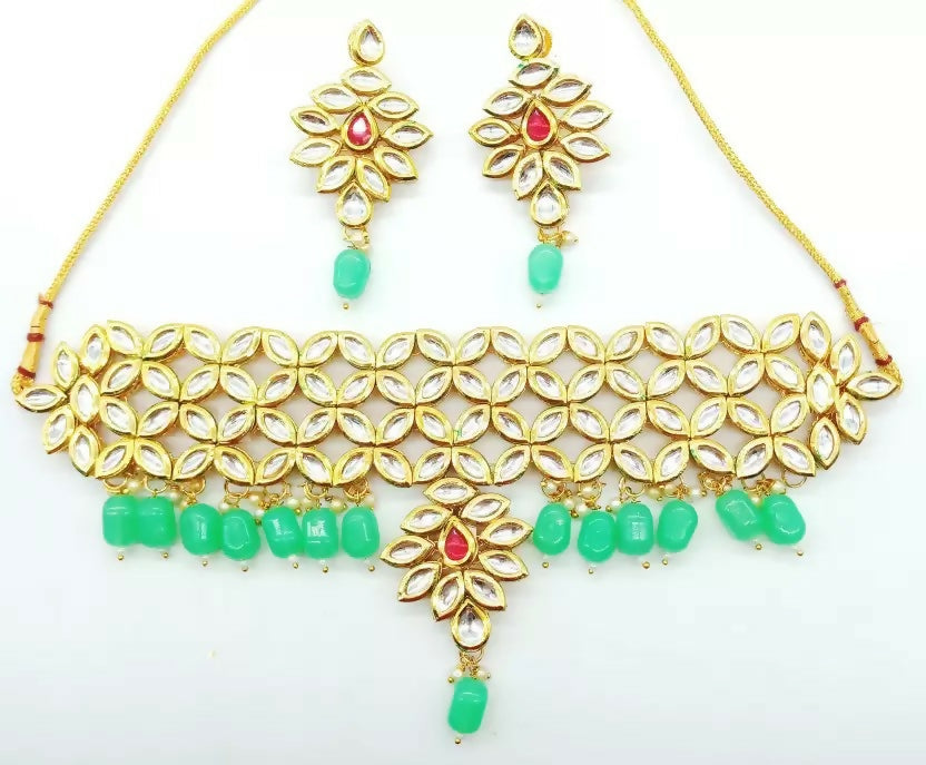 Vibrant multicolor Kundan stone necklace set with gold plating.