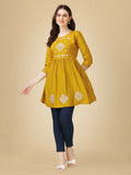Mustard yellow women's casual top with detailed embroidery and sequence work on viscose rayon.