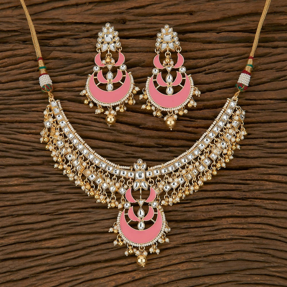 Golden White and Pink Kundan Pearl necklace set with intricate detailing