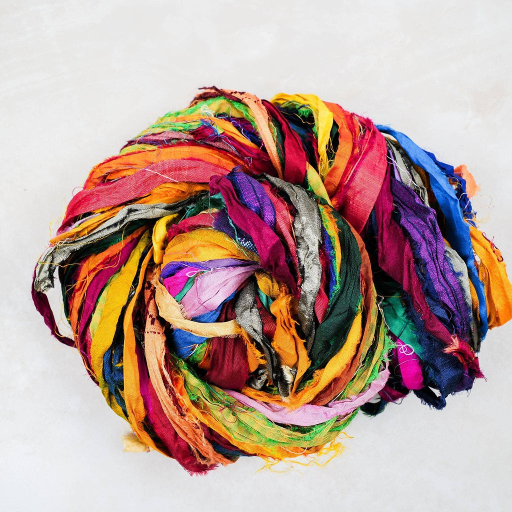 Skein of At the Bahamas sari silk ribbon with vibrant multi-color jewel tones