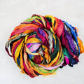 Skein of At the Bahamas sari silk ribbon with vibrant multi-color jewel tones