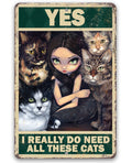 A gothic style aluminum metal sign featuring a girl with four cats and the text Yes I Really Do Need All These Cats