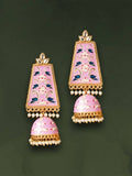Close up of Johar Kamal pink Kundan Meenakari Jhumka earrings with oxidised finish