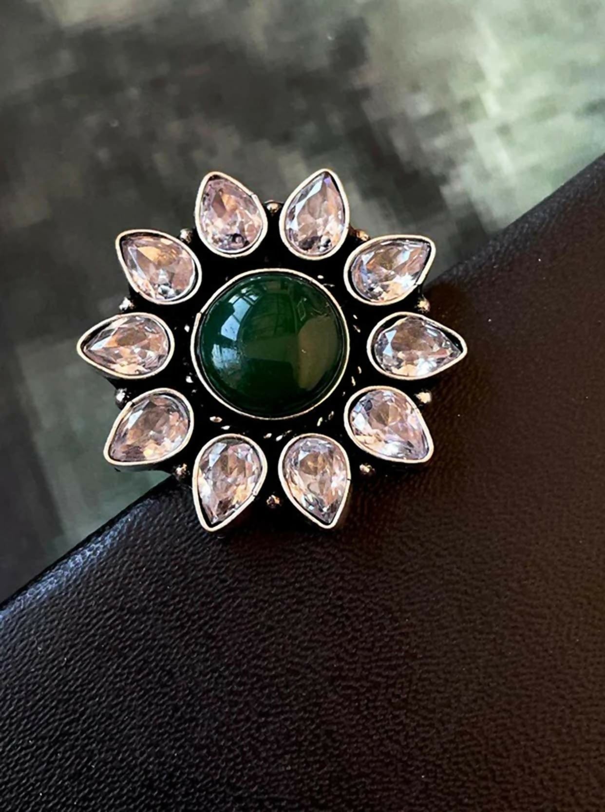 Green Monalisa stone brass adjustable ring showing intricate craftsmanship and vibrant color