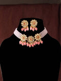 Elegant gold-polished necklace set with pink beads and white pearls for festive wear