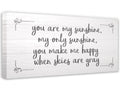 You Are My Sunshine canvas wall art in a nursery with white wood texture design.