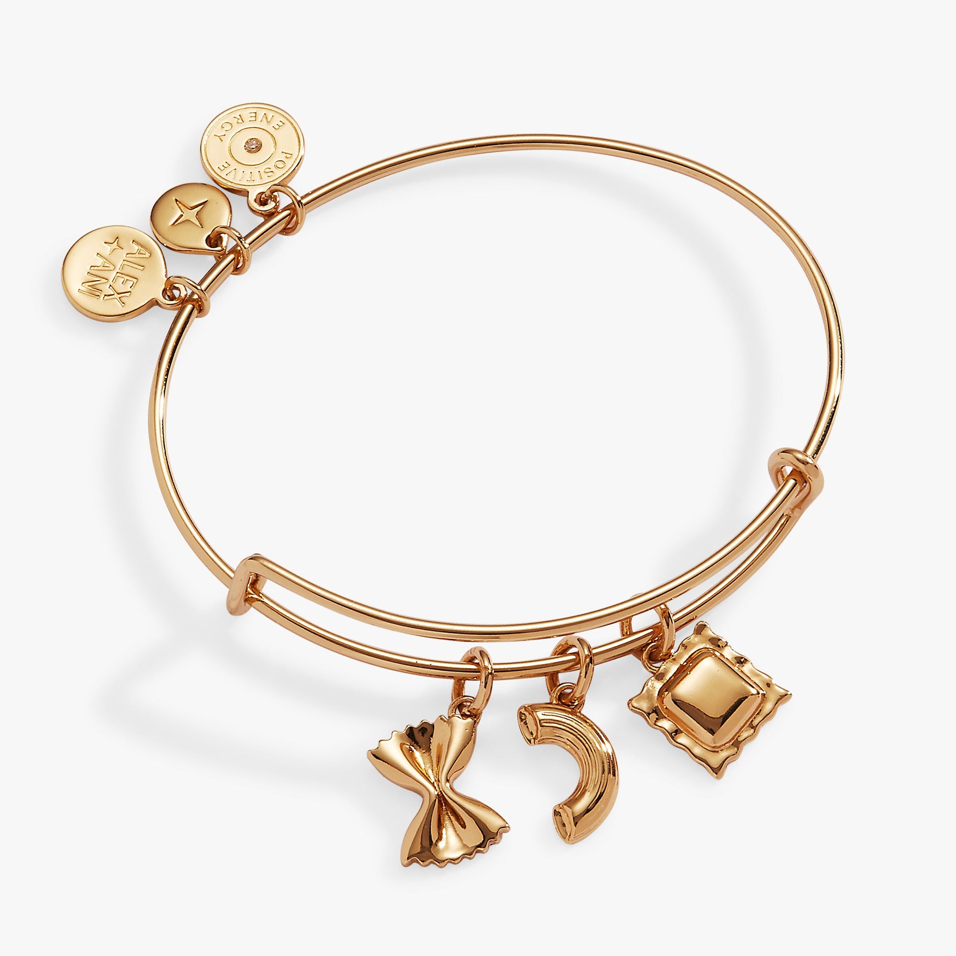 Gold-tone expandable bangle featuring three pasta-shaped charms including ravioli, macaroni, and bowtie pasta.