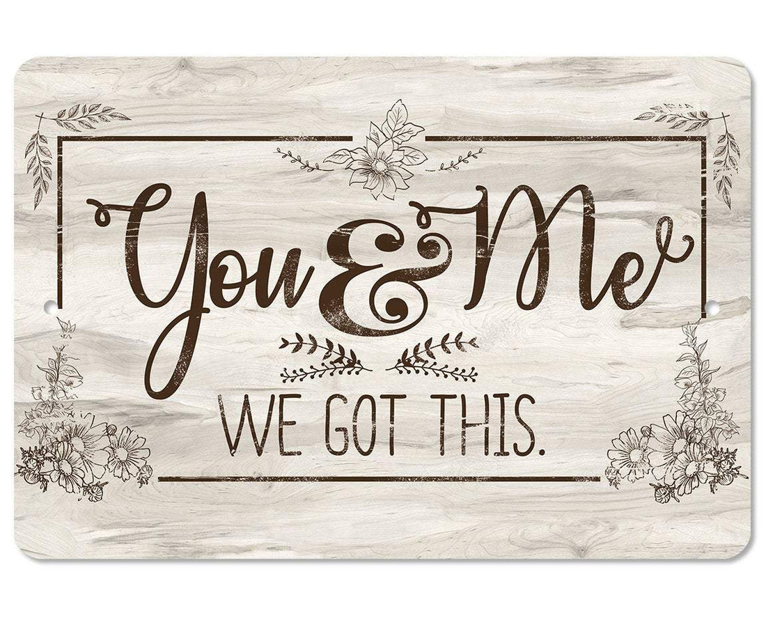 Rustic white wood-look metal sign featuring the quote You & Me WE GOT THIS with floral details