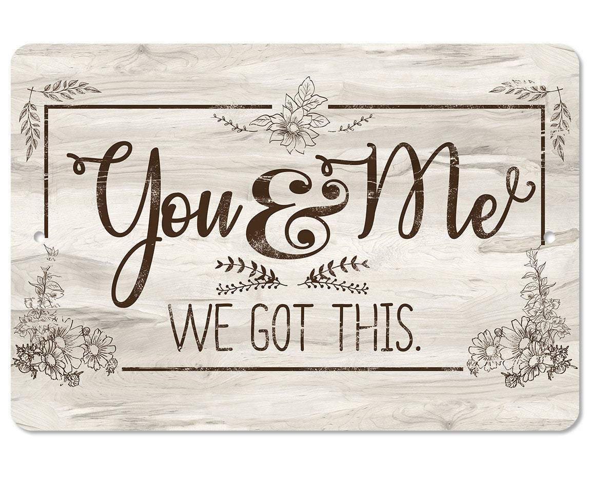 Rustic white wood-look metal sign featuring the quote You & Me WE GOT THIS with floral details