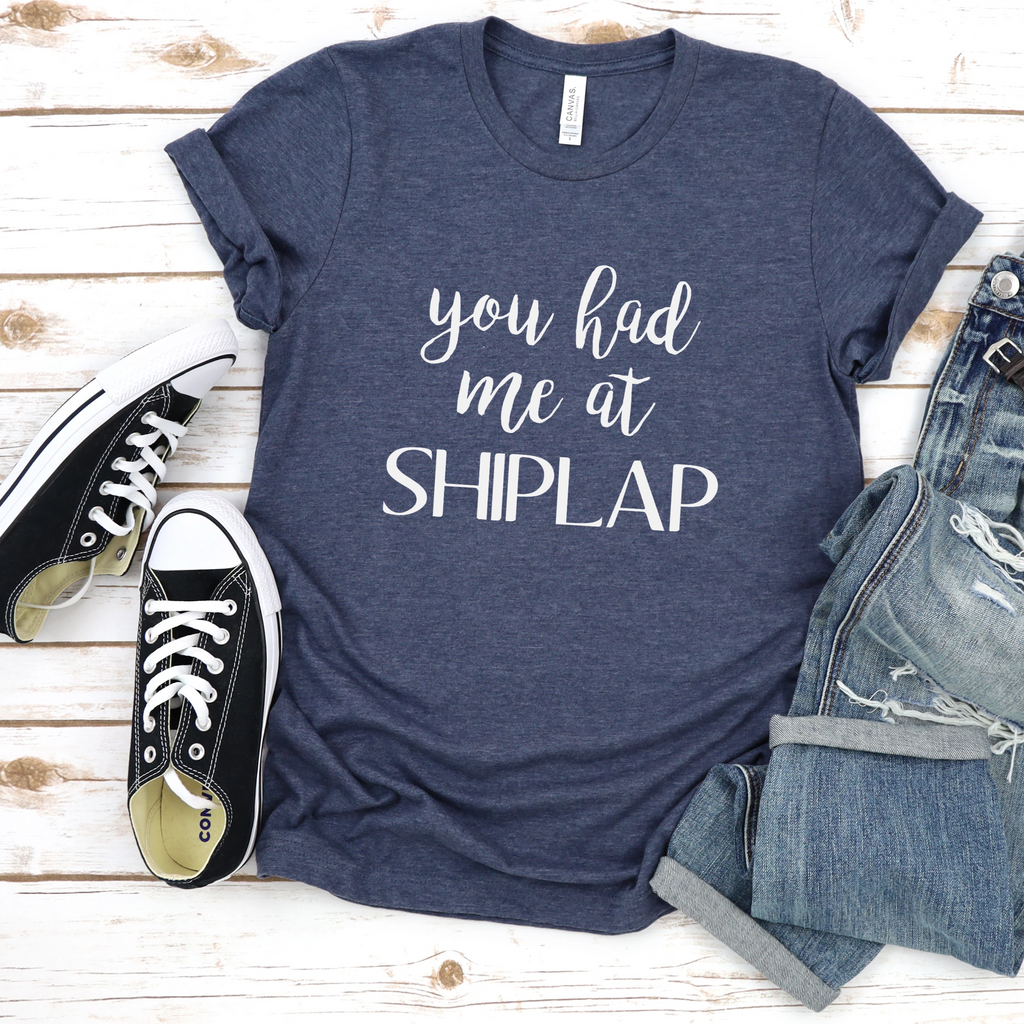 Heather navy unisex t-shirt with the text You Had Me At Shiplap in white print